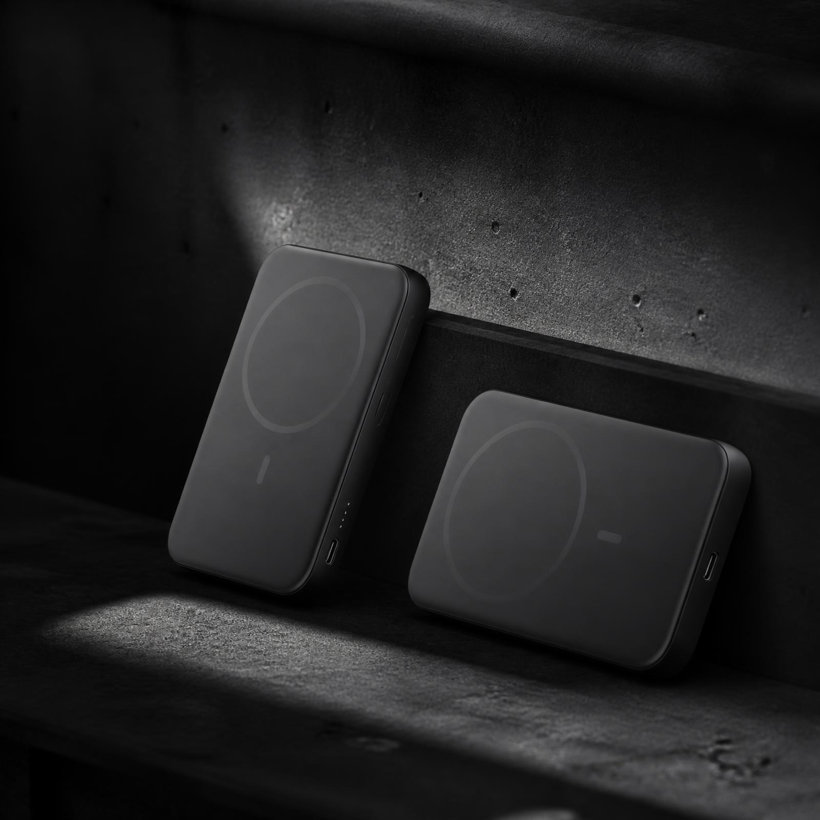MAGLINK magnetic wireless power banks on dark concrete steps